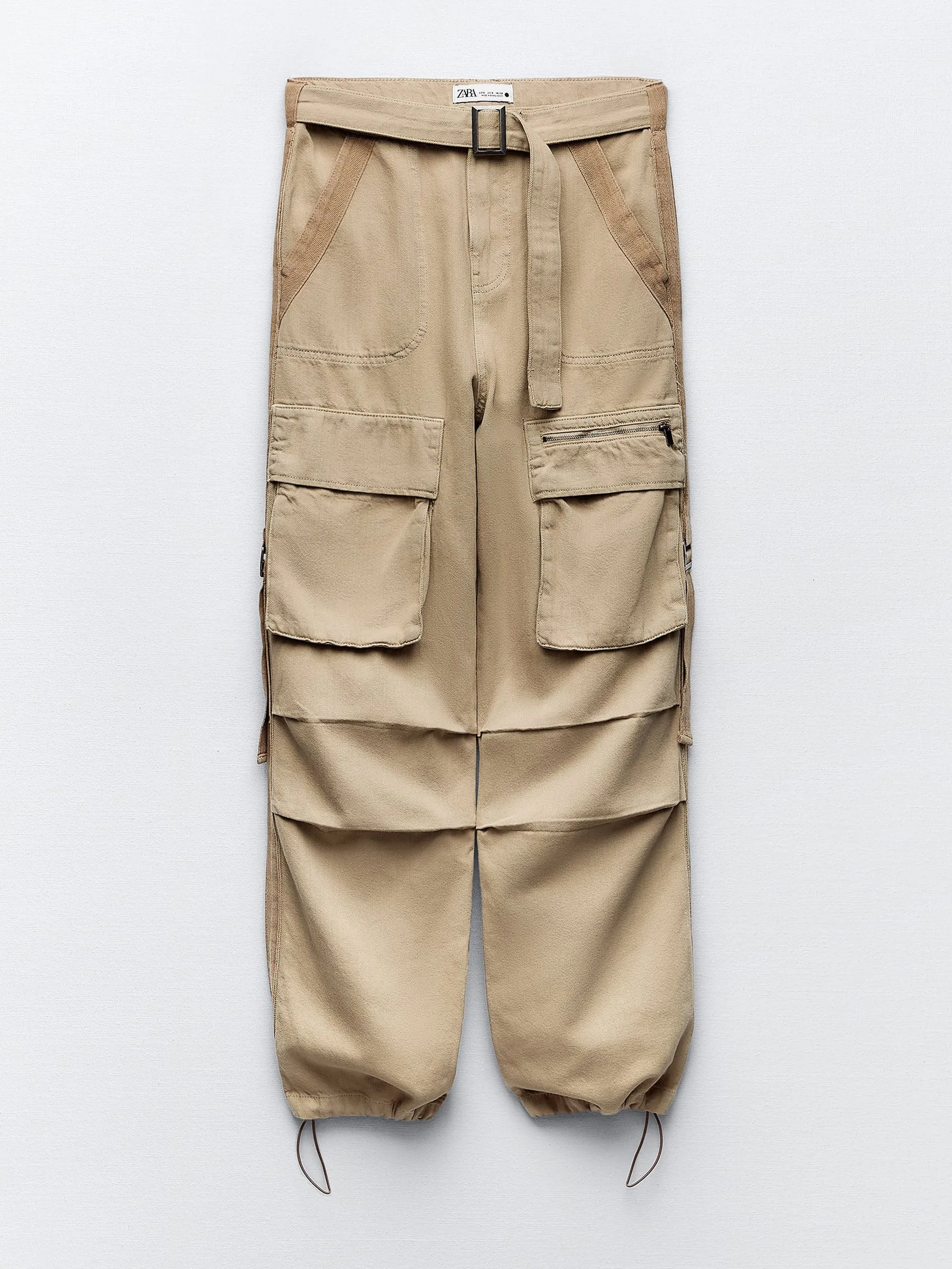 Beige cargo trousers with straps